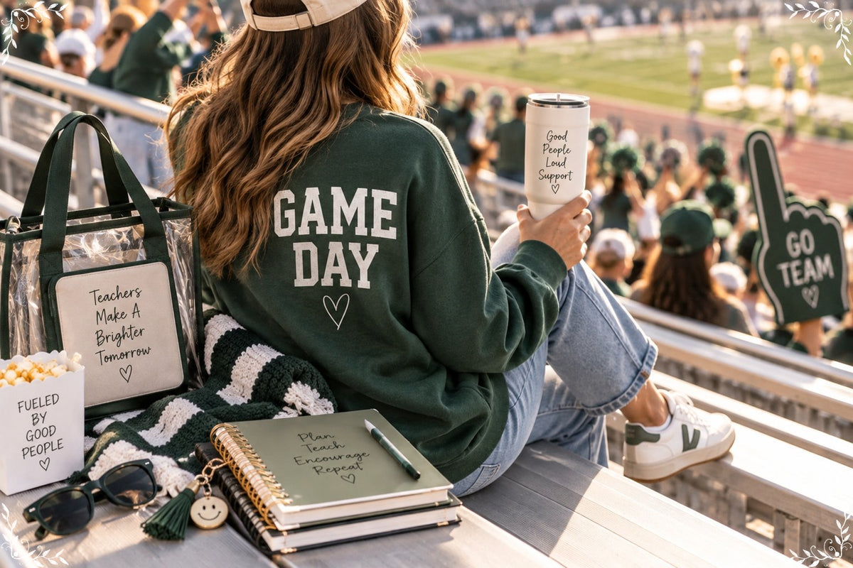 Casual layered game day outfit near football bleachers